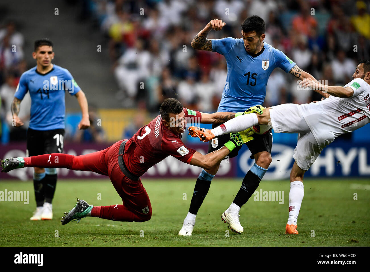 Fernando Muslera of Uruguay, front, saves the ball in the round of 16 match  between Uruguay and Portugal during the 2018 FIFA World Cup in Sochi, Russ  Stock Photo - Alamy