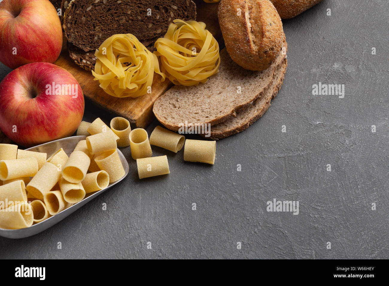 Close up of food with healthy carbohydrates on gray Stock Photo