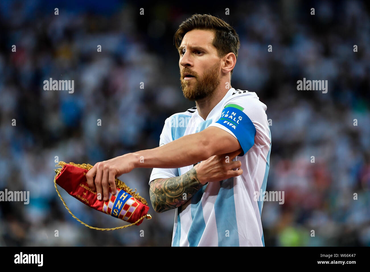 Lionel Messi of Argentina adjusts the captain armband before their Group D match against Croatia during the 2018 FIFA World Cup in Nizhny Novgorod, Ru Stock Photo