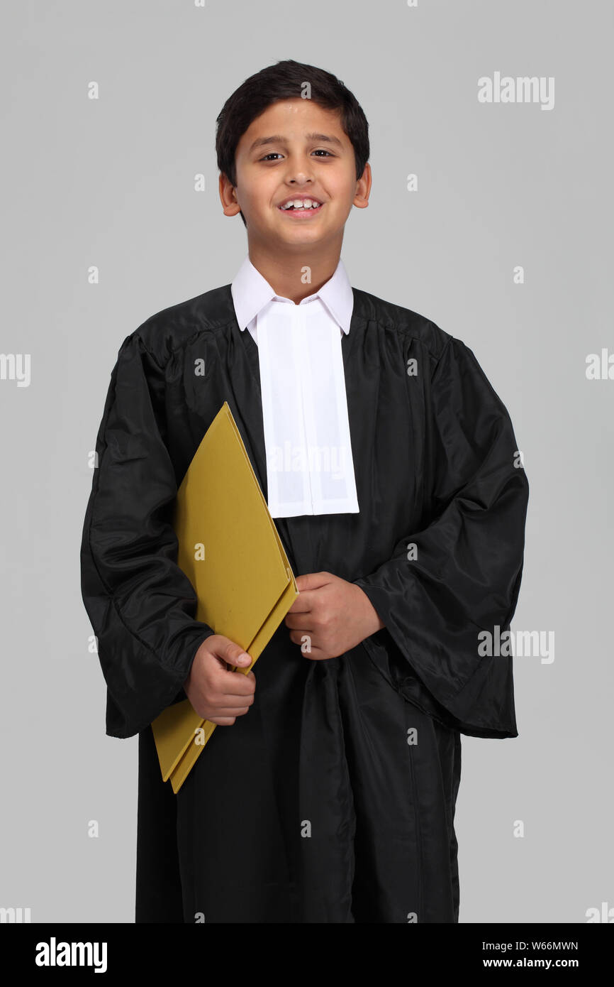 Boy pretending to be a lawyer and smiling Stock Photo Alamy