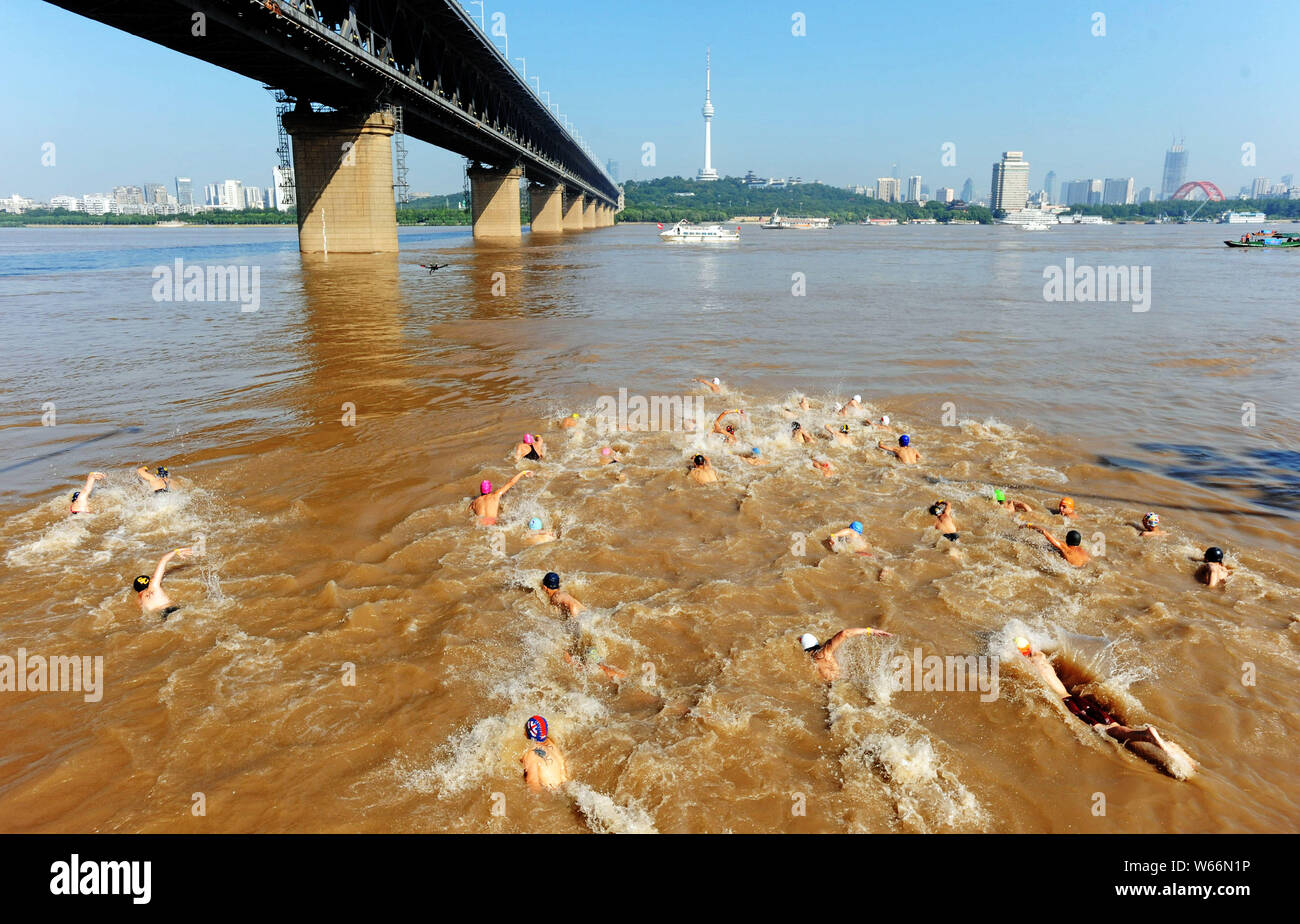 Swimmers Take Part In The 18 Yangtze River Swimming Race To Mark The 51th Anniversary Of Chairman Mao Zedong S Swimming Tour Of The Yangtze River In Stock Photo Alamy