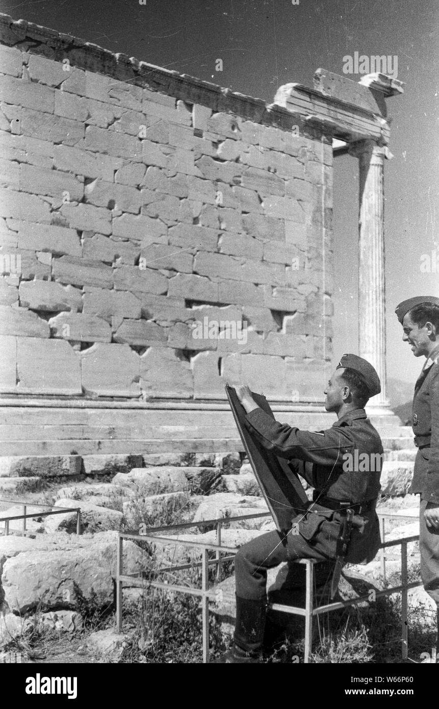 German Airforce soldiers on sightseeing tour on the famous Akropolis Temple in Athena in 1941 durch Greece occupation by German Wehrmacht Stock Photo