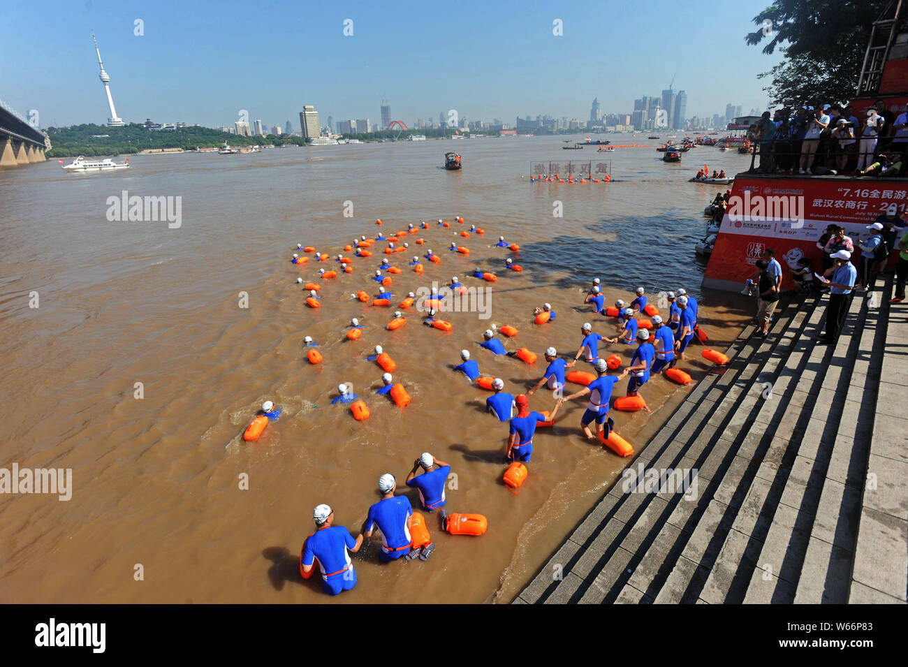 Swimmers Take Part In The 18 Yangtze River Swimming Race To Mark The 51th Anniversary Of Chairman Mao Zedong S Swimming Tour Of The Yangtze River In Stock Photo Alamy