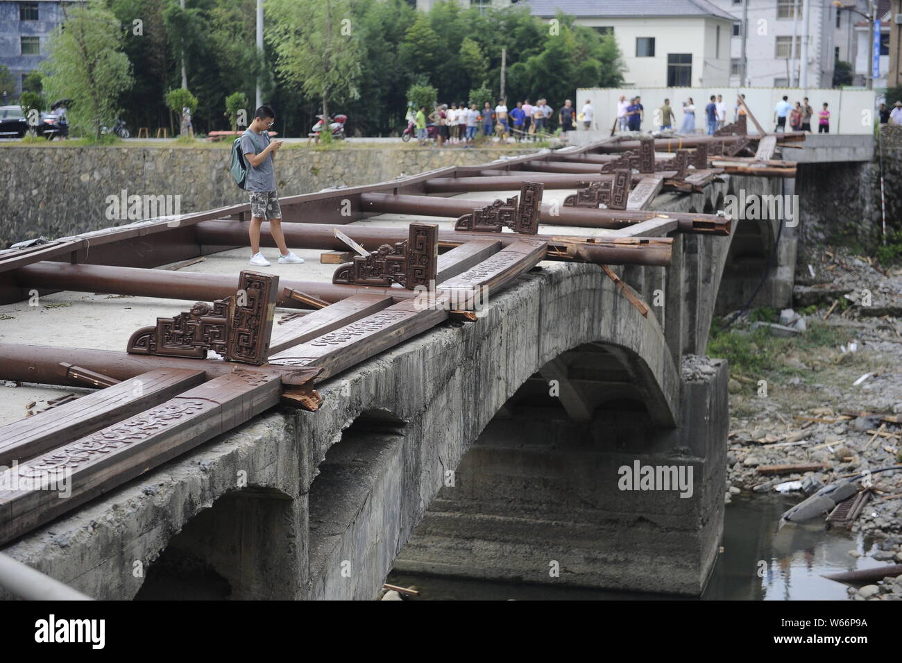 View of the accident site after a bridge collapsed, killing eight and injuring three, caused by severe weather in Hecun village, Tonglu county, Hangzh Stock Photo