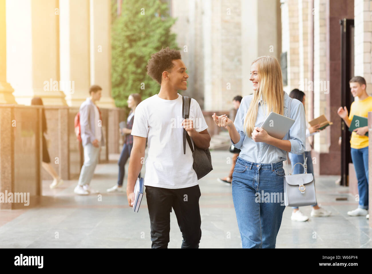Education concept. Students walking in university campus Stock Photo