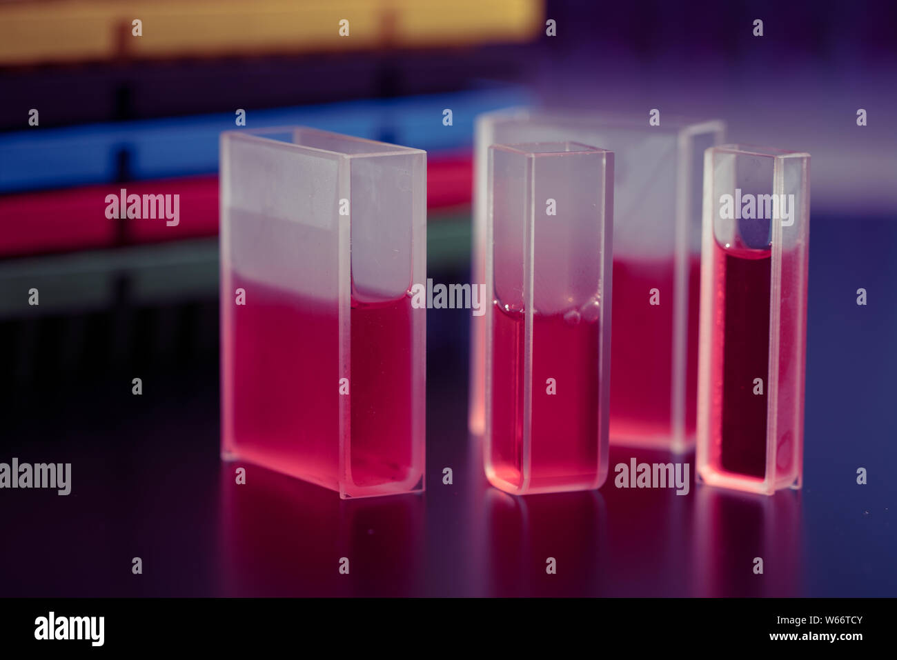 Quartz cuvette with the sample liquid for measurement Stock Photo Alamy