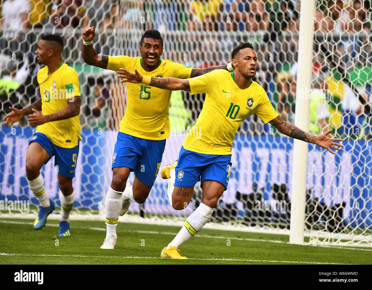 Neymar of Brazil, right, celebrates with his teammates after scoring a goal against Mexico in their Round of 16 match during the 2018 FIFA World Cup i Stock Photo