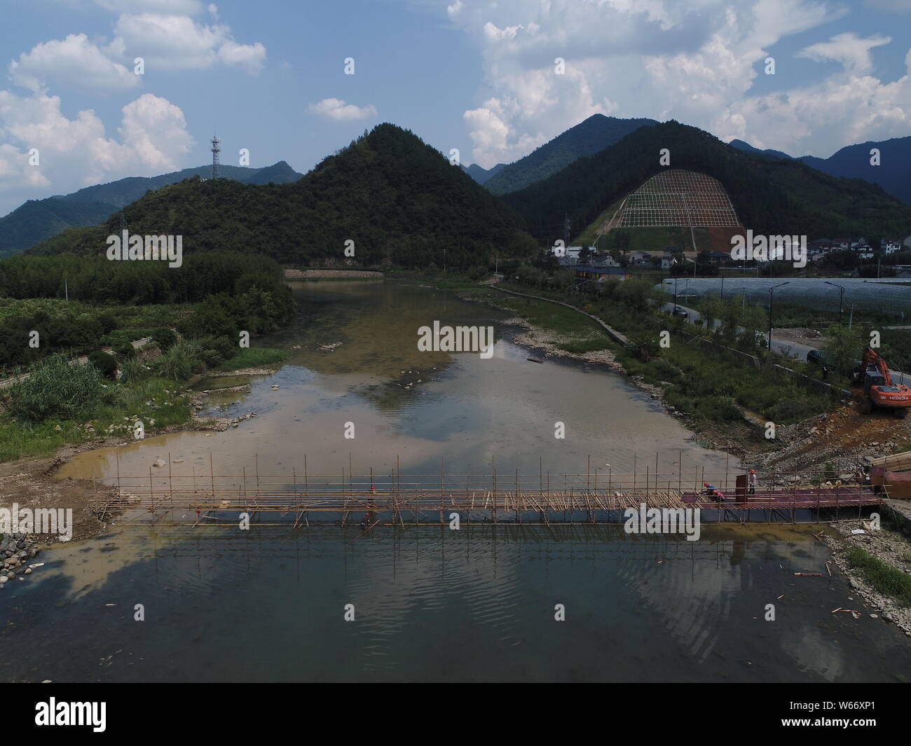 View of the accident site after a bridge collapsed, killing eight and injuring three, caused by severe weather in Hecun village, Tonglu county, Hangzh Stock Photo