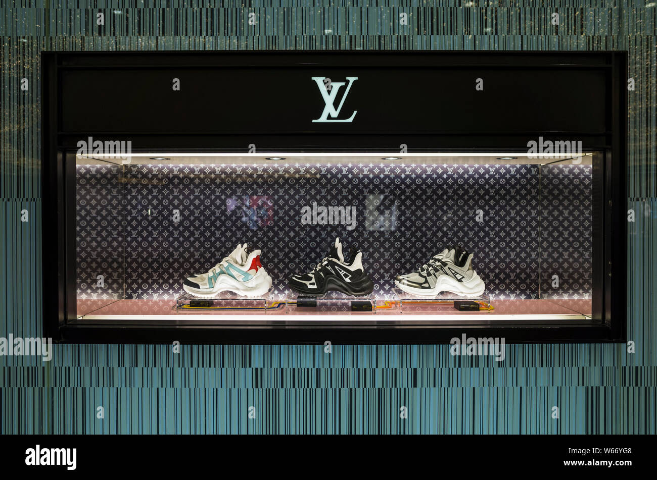 FILE--View of shoes showcased at a boutique of Louis Vuitton (LV) in Wuhan  city, central China's Hubei province, 6 June 2018. Perfume is playing Stock  Photo - Alamy