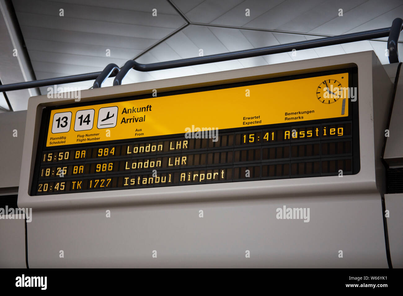 Arrivals board at Berlin airport Stock Photo