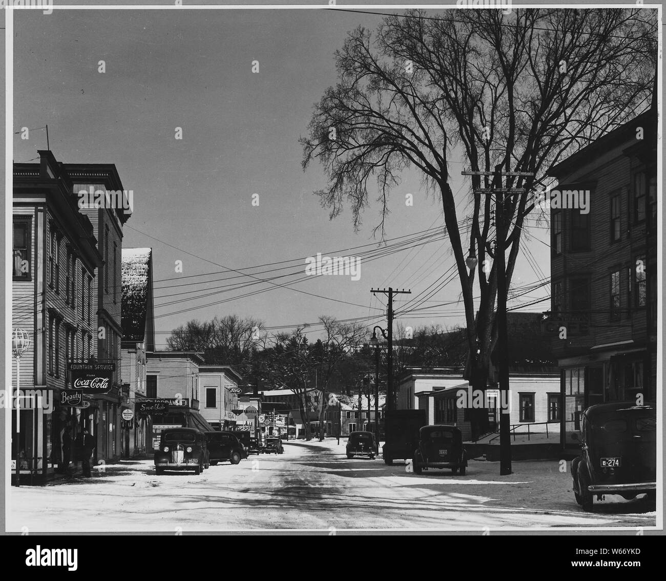 Landaff, Grafton County, New Hampshire. Though buying and selling is almost all done here in Lisbon . . .; Scope and content:  Full caption reads as follows: Landaff, Grafton County, New Hampshire. Though buying and selling is almost all done here in Lisbon village, Landaff people do not consider themselves as belonging in any way to this community. Shown here is most of the main street. The village boasts several churches, stores and the offices of quite a few professionals. The population of Lisbon is over 2,000. Stock Photo