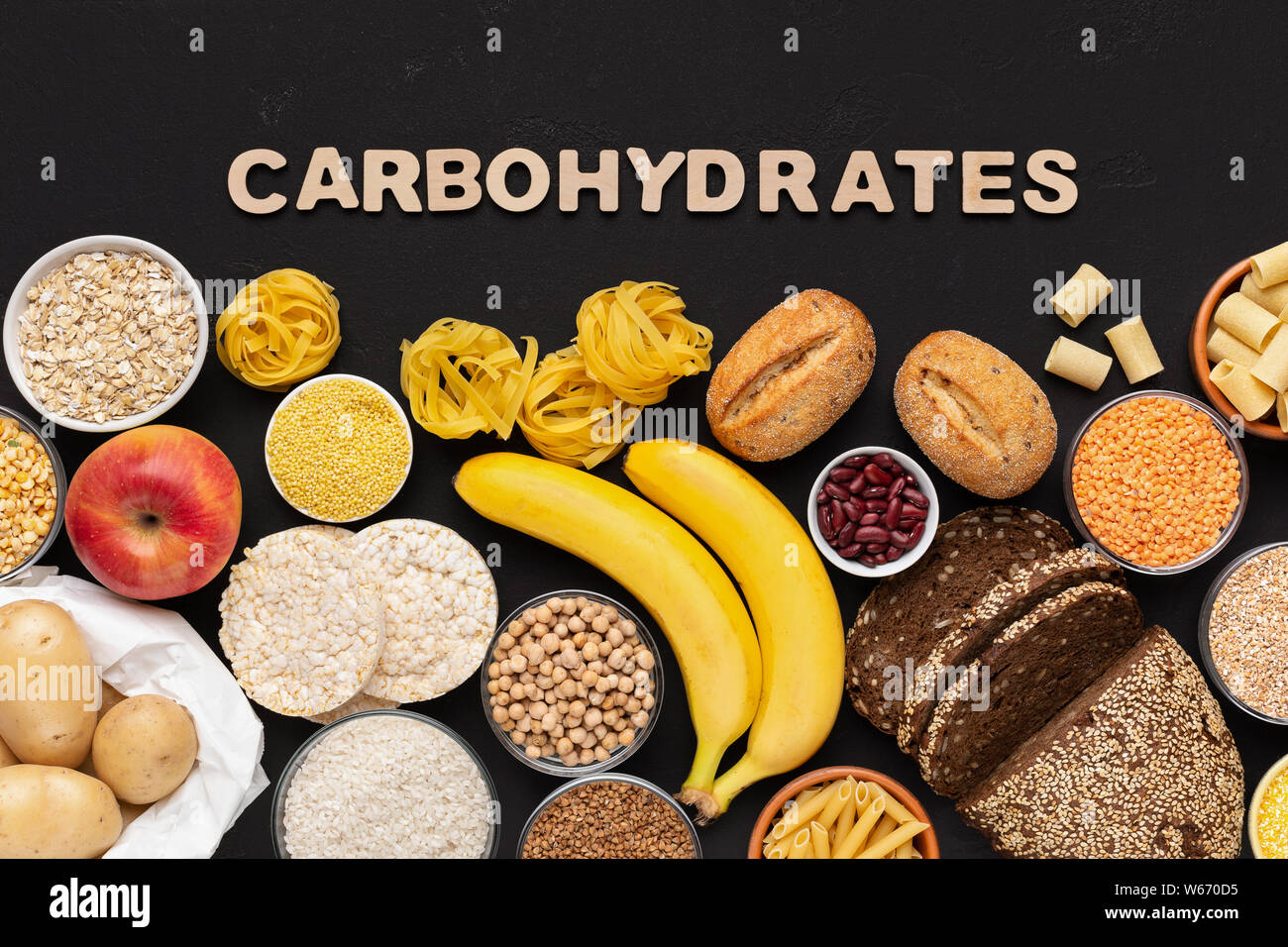 Healthy food with carbohydrates on black background Stock Photo