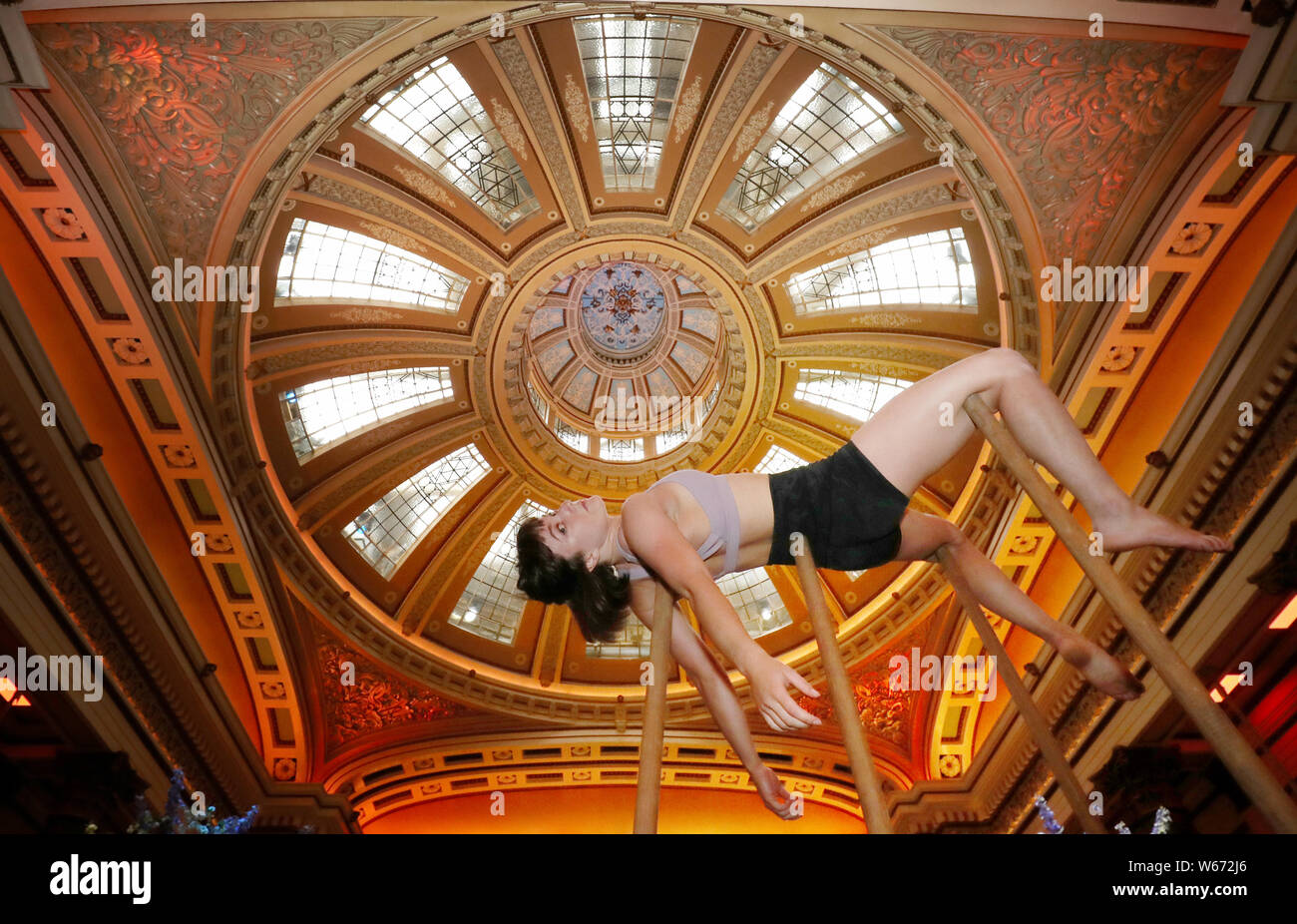 Acrobat Alyssa Moore from contemporary circus company Gravity & Other Myths practices part of a routine from their show Backbone at The Dome in Edinburgh ahead of their Edinburgh Festival Fringe debut at Underbelly's McEwan Hall. Stock Photo