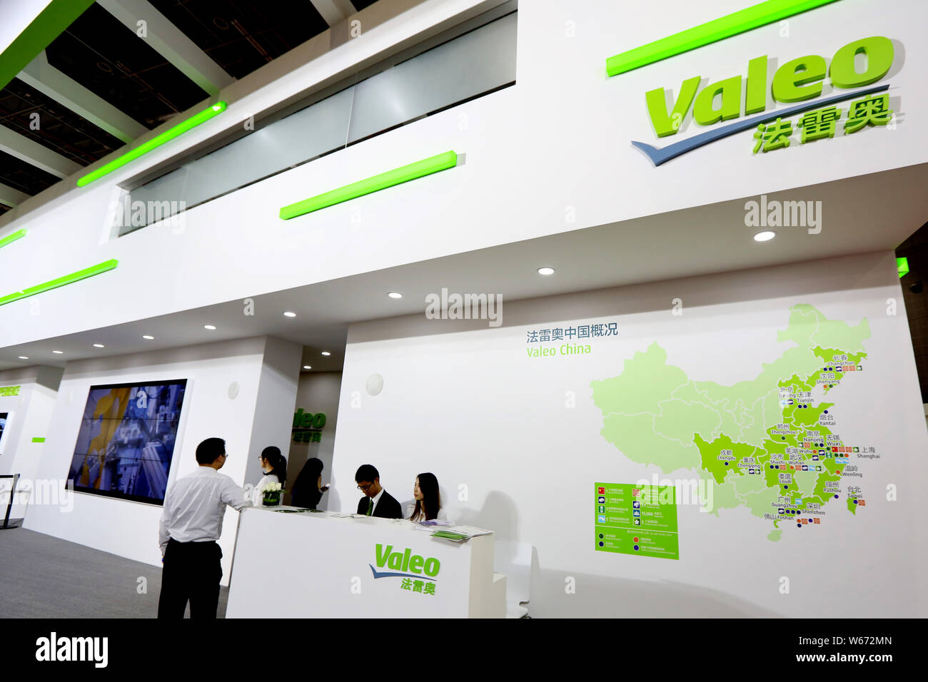 --FILE--A visitor is seen at the stand of French car parts supplier Valeo during the 16th Shanghai International Automobile Industry Exhibition, known Stock Photo