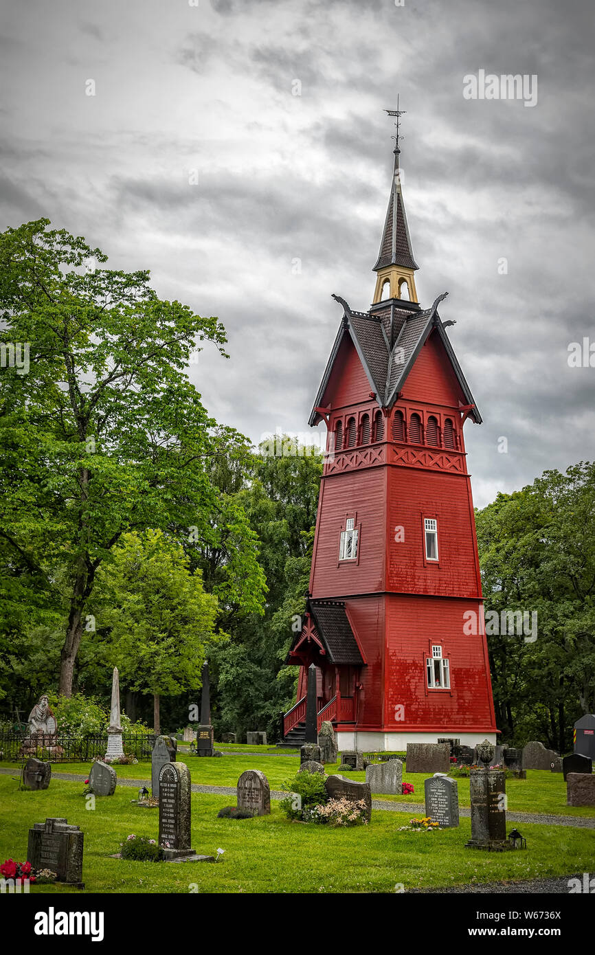 TRONDHEIM, NORWAY - JULY 15, 2019: Tilfredshet chapel and the associated crematorium are centrally located on the cemetery along with the bell tower. Stock Photo