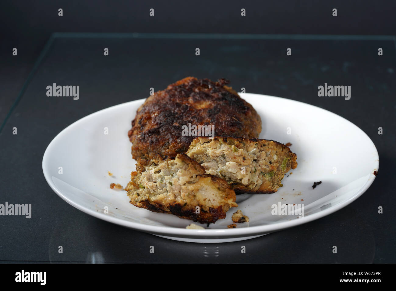 Delicious meatballs fried crispy brown and served hot Stock Photo