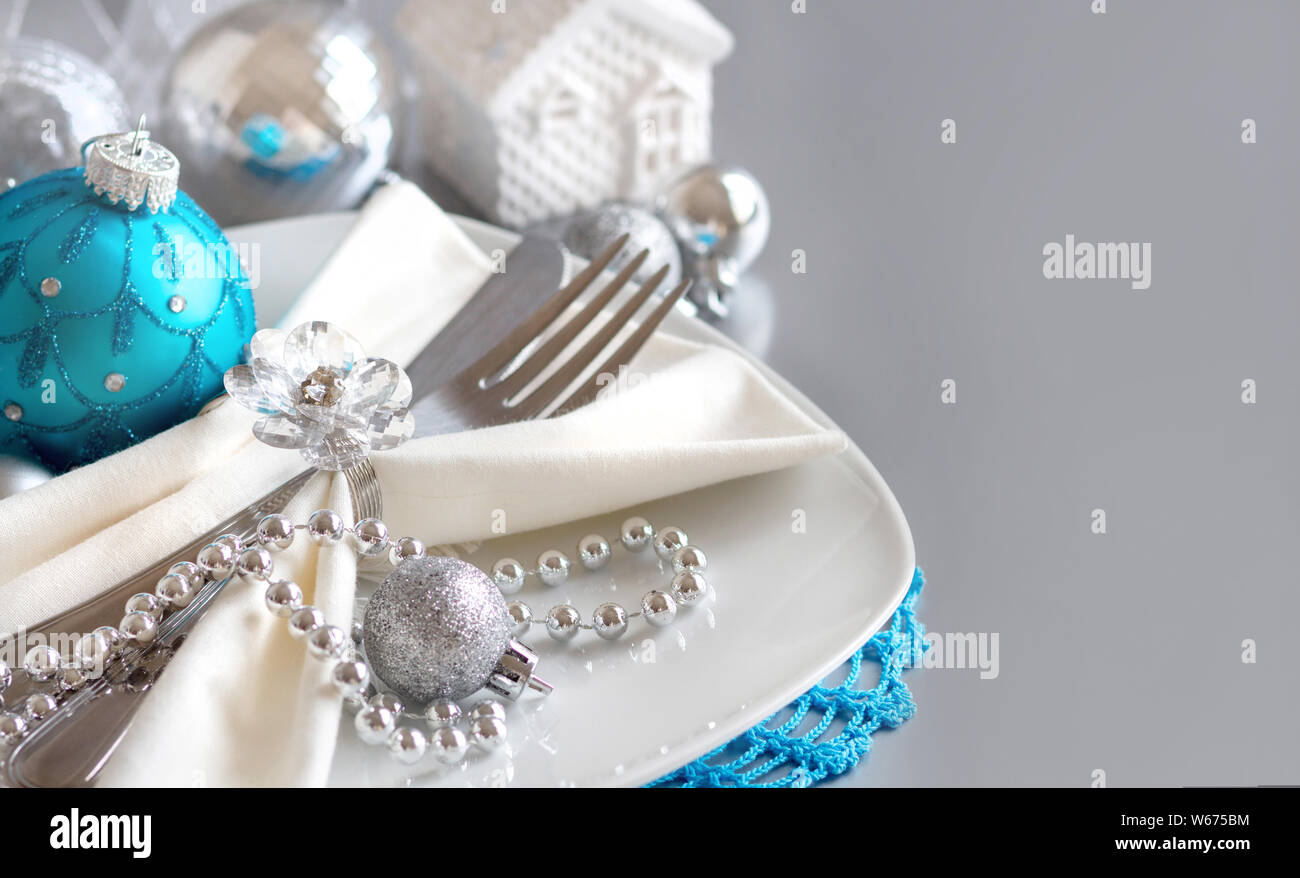 Turquoise Blue And Silver Christmas Table Setting Close Up Stock