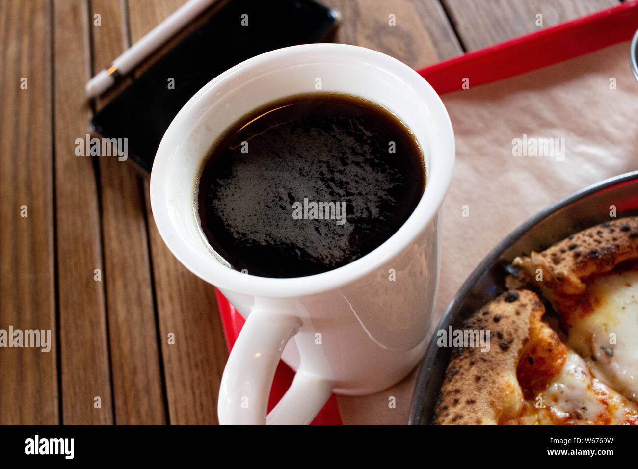 Hot Coffee and Cheese pizza on wood table Stock Photo Alamy