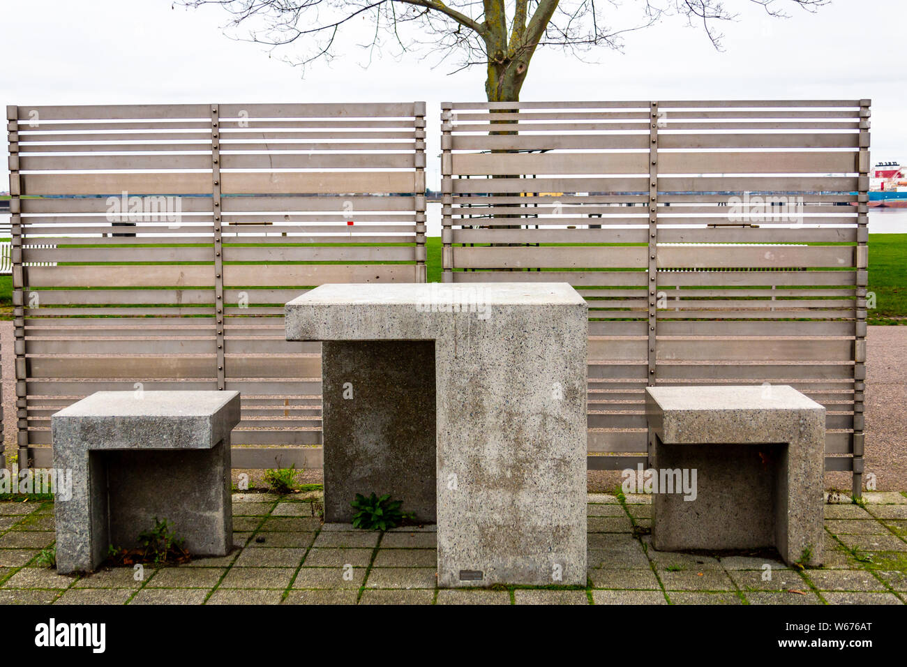 Concrete furniture outside a fish and chip shop in Gravesend pier, Kent