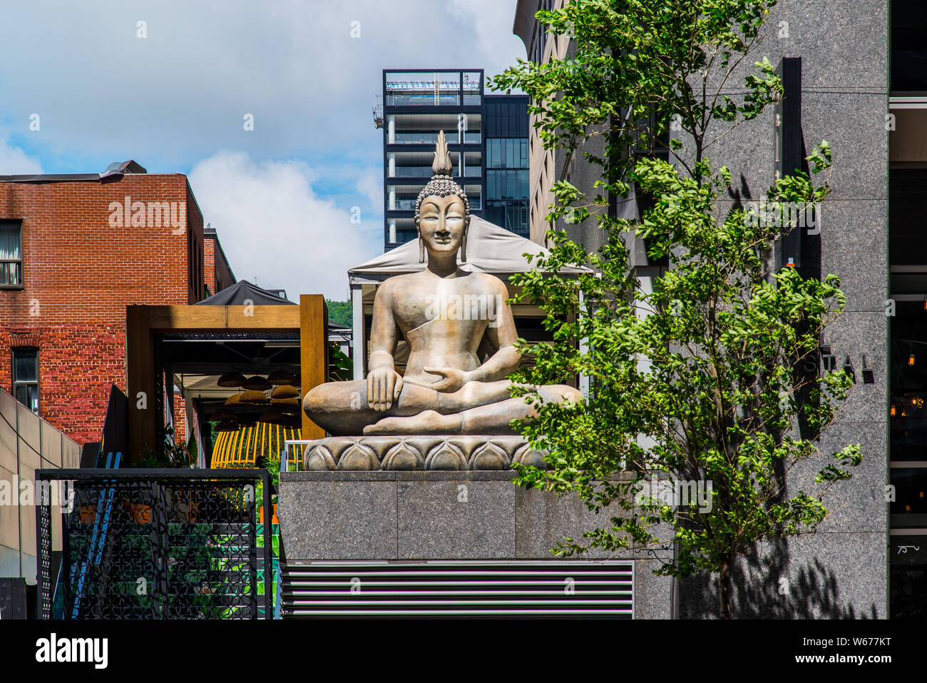 The Budha Statue in Montreal dowtown Stock Photo