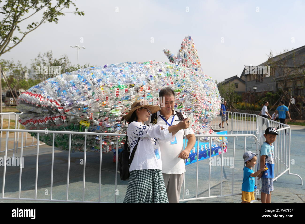 View of a 'whale shark' made of waste plastic bottles to raise awareness of environmental protection at the Rizhao Ocean Park in Rizhao city, east Chi Stock Photo
