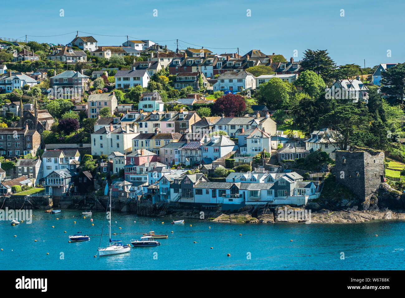 The small coastal town of Fowey with hillside houses. Cornwall, UK