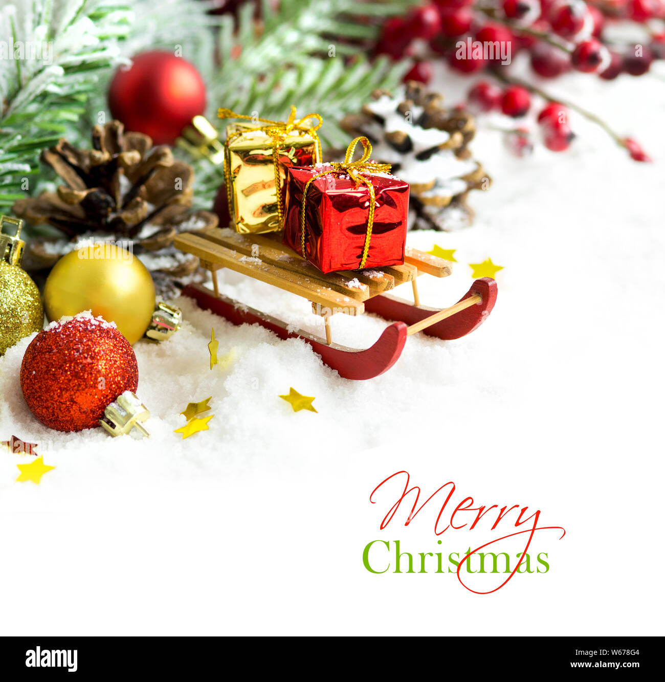 Christmas composition with tree branch, pine cones and decorations ...