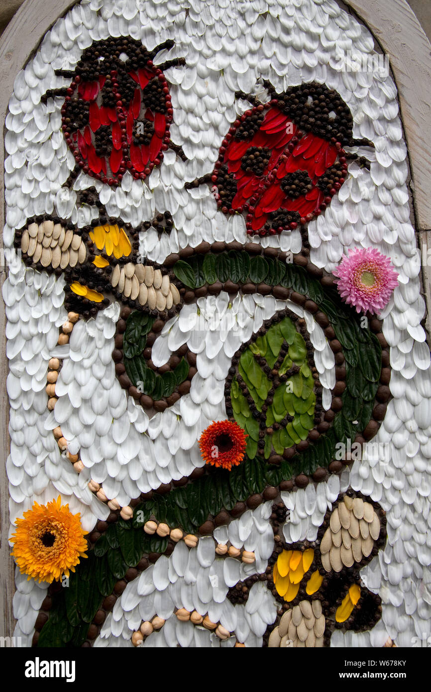 Well dressing in Swanwick - the art of decorating springs and wells with pictures made from natural materials, mainly flowers is an ancient custom fou Stock Photo