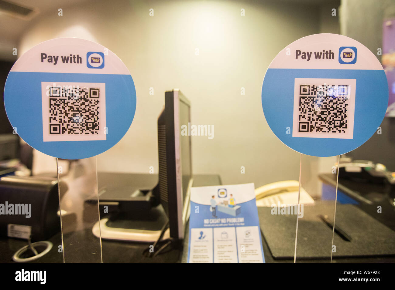 QR codes are displayed to facilitate customers to pay via the mobile e-wallet payment service Touch&Go operated by TNG Digital Sdn Bhd, the joint-vent Stock Photo
