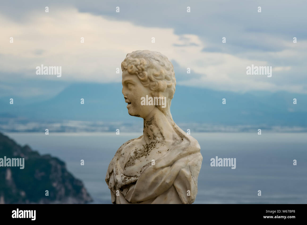 Beautiful statue from the belvedere, the so-called Terrazza dell'infinito, The Terrace of Infinity seen on the sunset, Villa Cimbrone, Ravello village Stock Photo