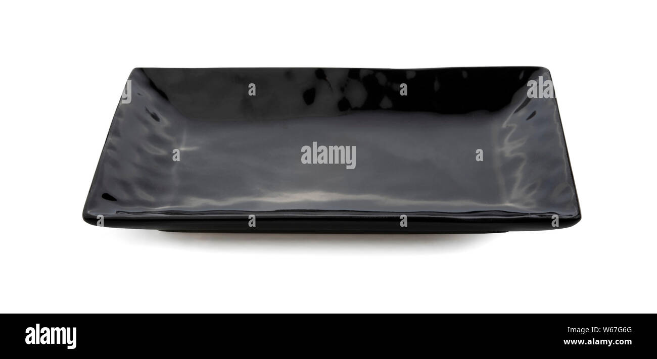 Black plate isolated on white background Stock Photo