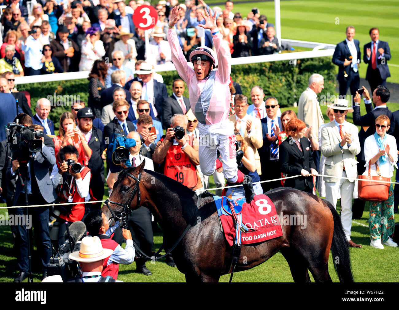 Jockey Frankie Dettori Celebrates Winning The Qatar Sussex Stakes By Jumping Off Horse Too Darn Hot During Day Two Of The Qatar Goodwood Festival At Goodwood Racecourse Chichester Stock Photo Alamy