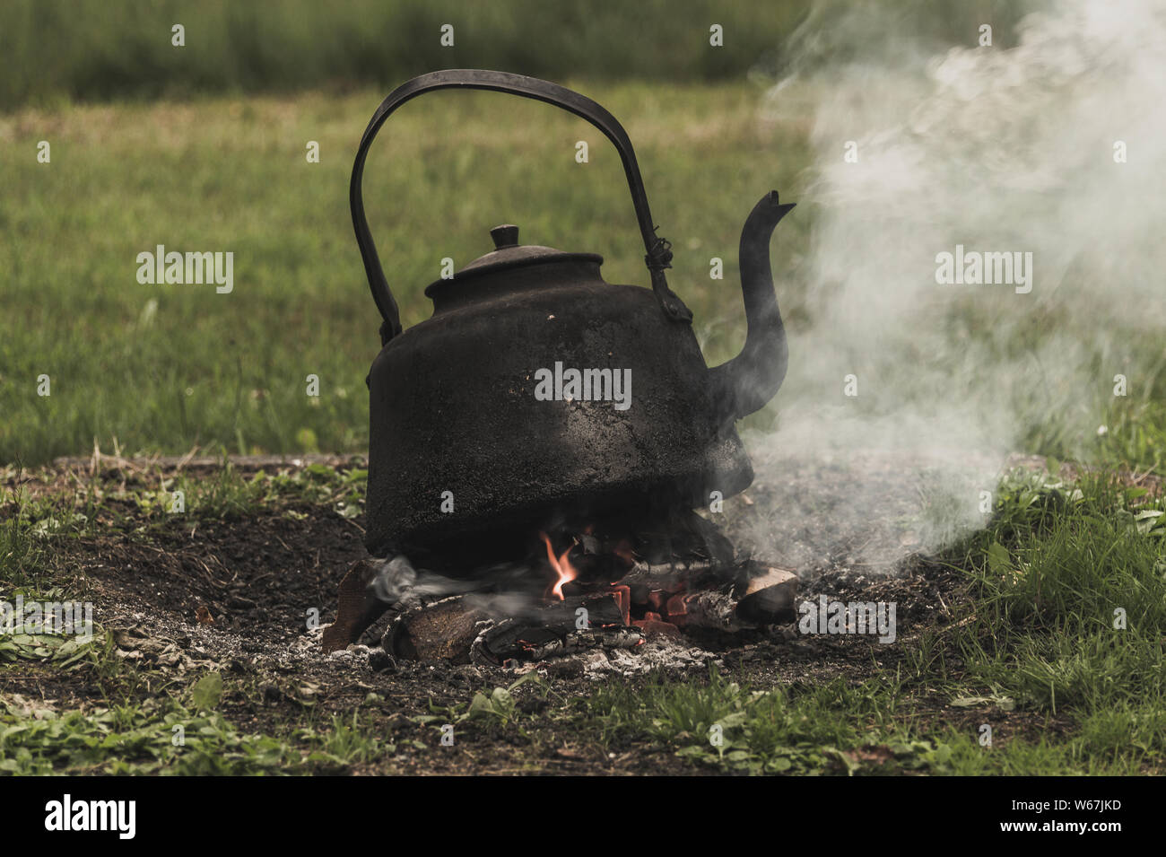 Black kettle on fire during daytime photo – Free York Image on