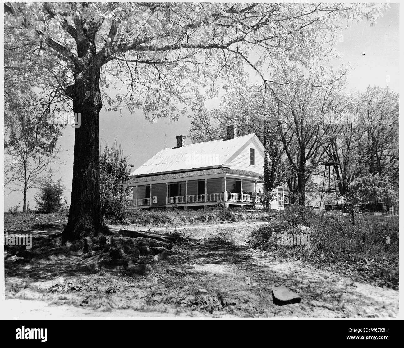 Newberry County, South Carolina. Rehabilitated home on permanent farm on Enoree District, Sumter Nat . . .; Scope and content:  Full caption reads as follows: Newberry County, South Carolina. Rehabilitated home on permanent farm on Enoree District, Sumter National Forest planned as part of a forest community subsisted on a combined forest and agricultural economy. (Under special use permit to Mrs. A. H. Cromer, Newberry County) Stock Photo