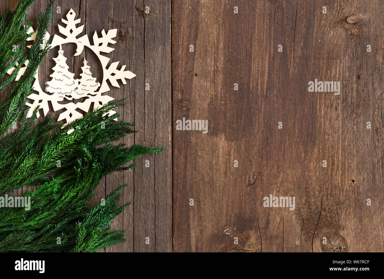 Christmas border design with snowflake on wood Stock Photo - Alamy