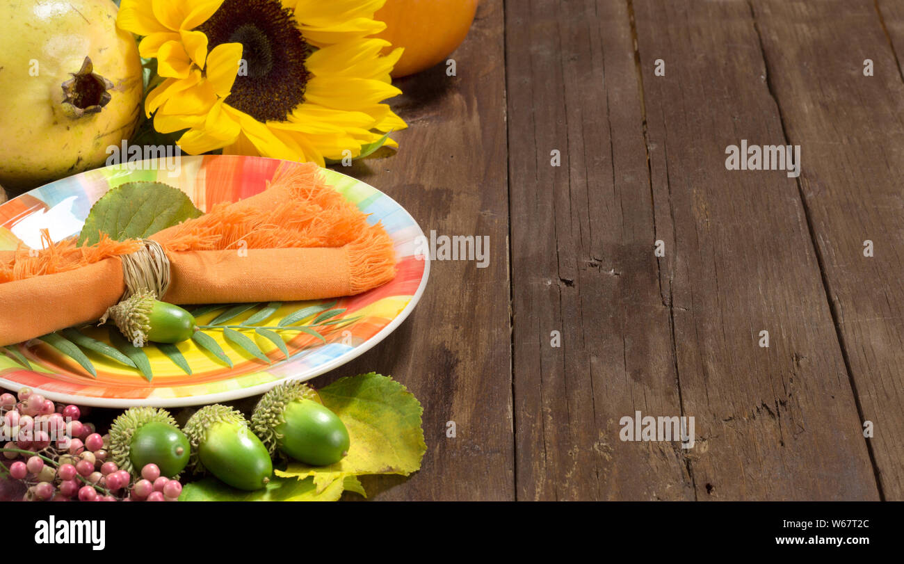 Rustic autumn table setting on a wooden table Stock Photo
