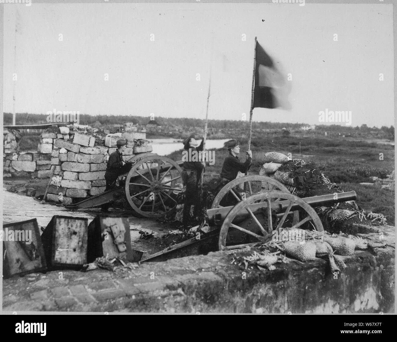 Photograph of American Flag Hoisted at Fort Malate, ca. 1898; Scope and content:  Original caption: Fort Malate-On left is staff flying American flag, which was hoisted (replacing Spanish colors) during action of August 13, 1898. Greely Collection. General notes:  Use War and Conflict Number 283 when ordering a reproduction or requesting information about this image. Stock Photo
