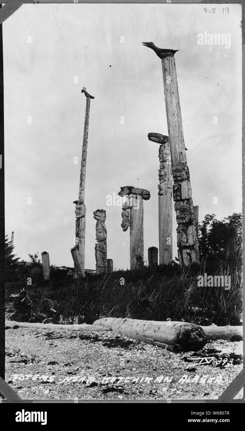 Post card. Totems near Ketchikan, Alaska.; Scope and content:  On Backing: On reverse side of this postal, in space provided for name of addressee, is following in handwriting: 'Mr. Henry S. Wellcome, c/o Mr. Wm. Duncan, Metlakahtla, Alaska. In space provided for correspondence is following: 'My. dear Mr. Wellcome: Having found this card this morning I am sending it to you in lieu of a photograph of the totems on Village Id. It covers only a small group, but the one in the middle, of the three frogs, is particularly interesting, I think.--however, I am sorry to have mislaid my own negative as Stock Photo
