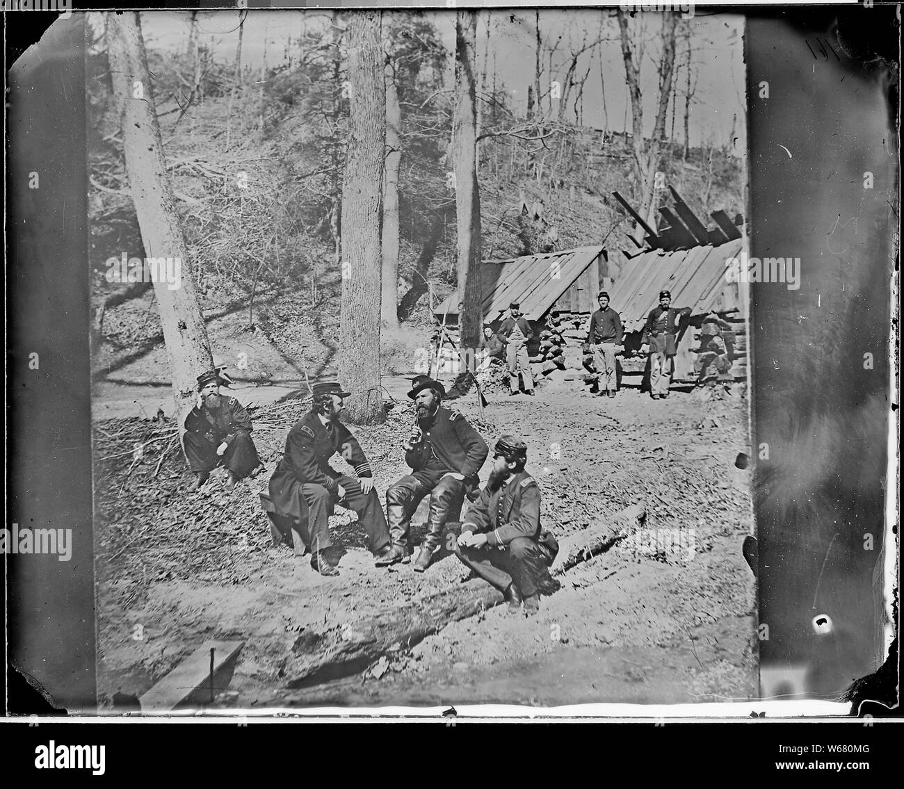 Prof. Maillefert and Naval Officers at Torpedo Station on James River probably taken in April or May 1865. Prof. Maillefert was engaged in removing the torpedoes and obstructions in the James River after close of the War. Stock Photo
