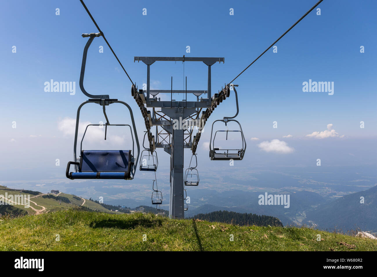 Chairlift at Krvavec ski resort in summer - Krvavec, Slovenia Stock Photo