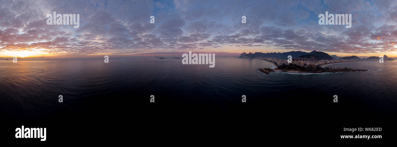 Sunrise 360 degree full panoramic aerial view of Rio de Janeiro with Arpoador and Ipanema beach in the foreground and the wider cityscape behind Stock Photo