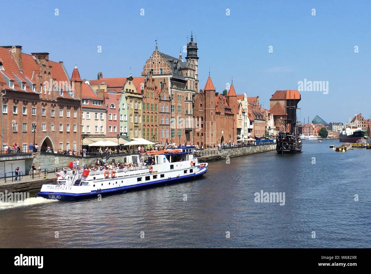 Cityscape of Gdansk with the ship at the river Motlawa - Poland. Stock Photo
