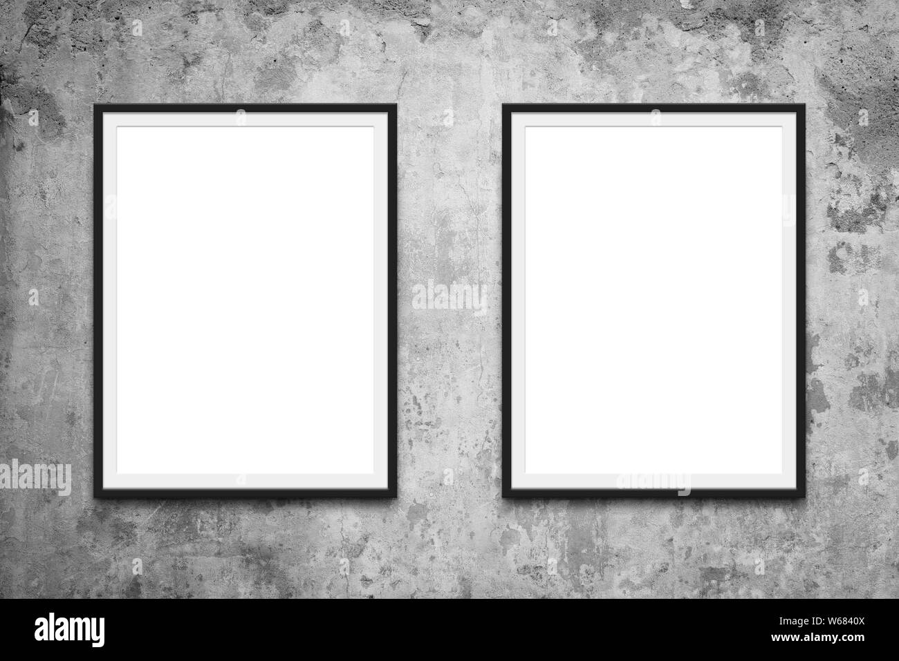 two picture frames hanging on wall mock-up Stock Photo