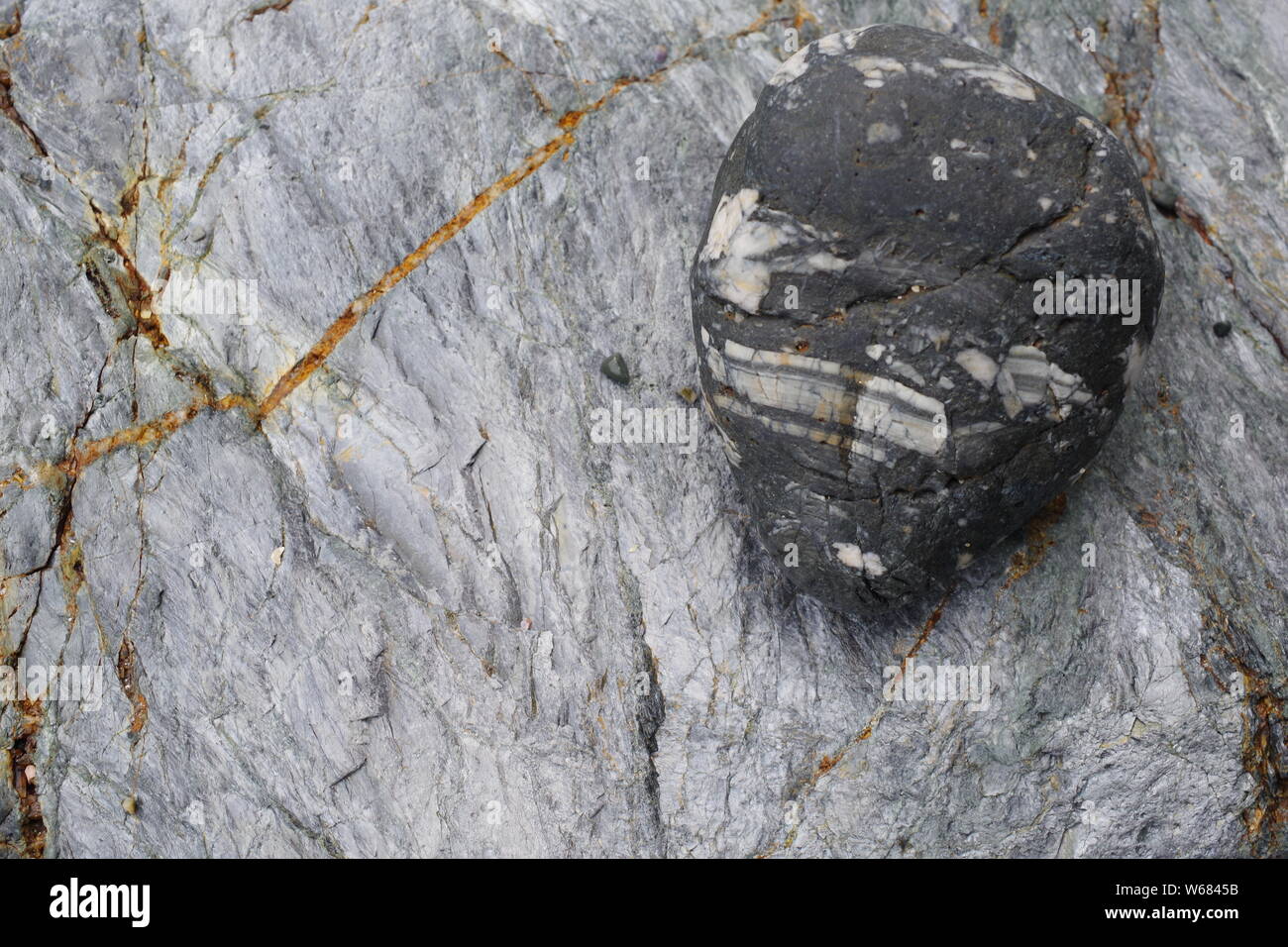 Natural Background of Metasedimentary Rock. Perran Iron Ore. St Agnes, North Cornwall, UK. Stock Photo