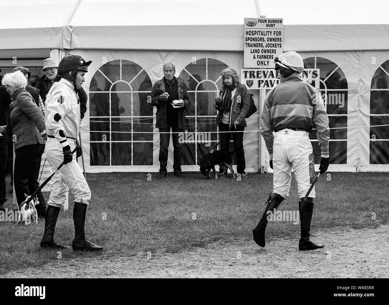 Jockeys At The Four Burrow Hunt Point To Point Horse Race 2019 Stock jockeys-at-the-four-burrow-hunt-point-to-point-horse-race-2019-stock