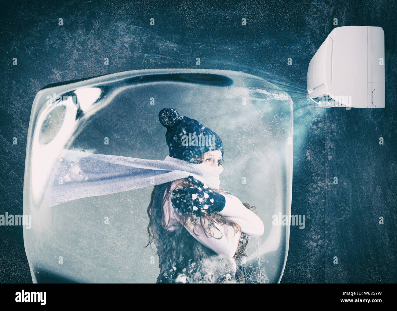 Woman frozen in an ice cube under the air jet of an air conditioner