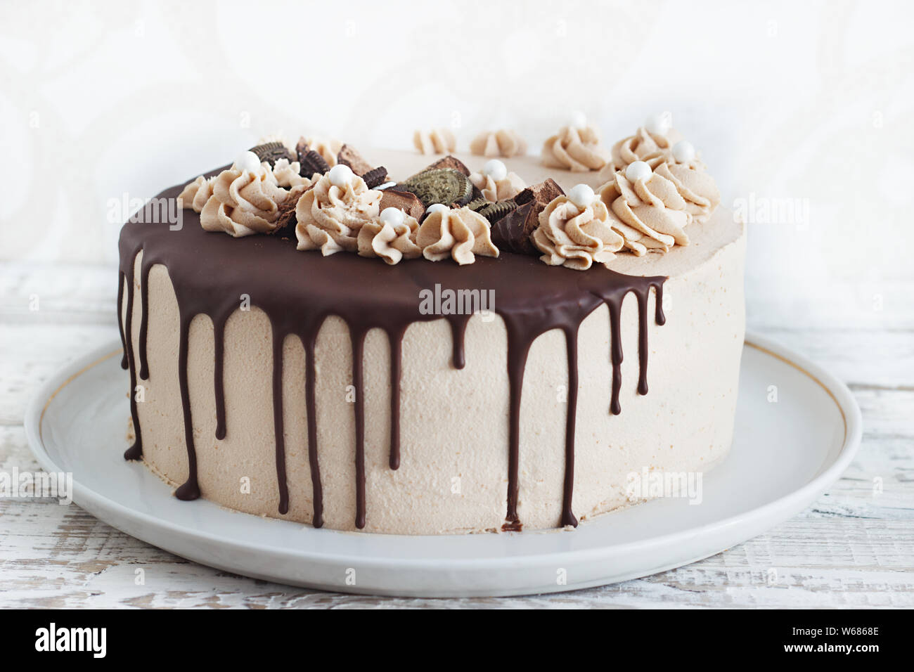 Chocolate Cake with Chocolate Fudge Drizzled Icing and Chocolate Curls
