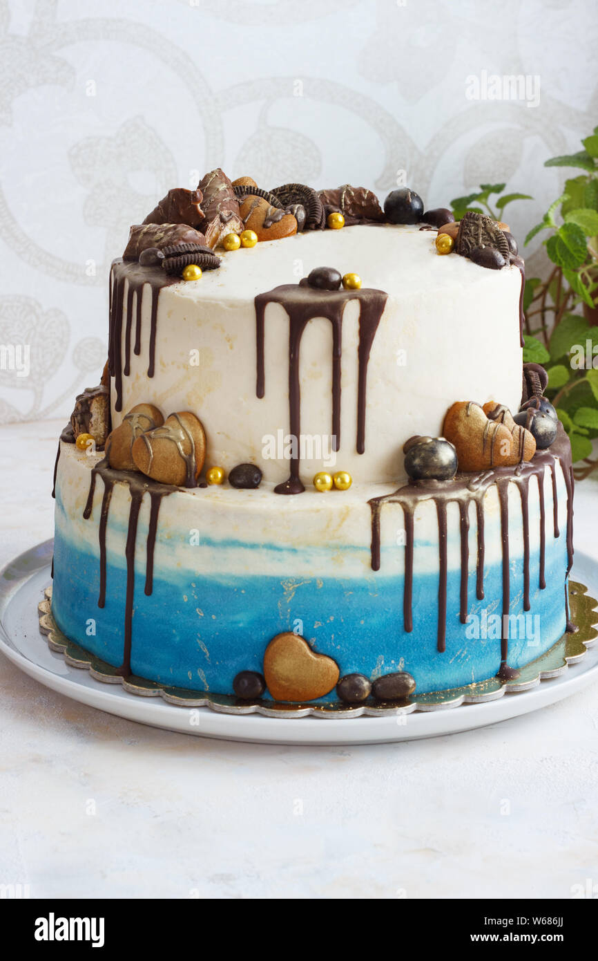 Tiered Birthday Cake On A Light Background Male Cake Stock Photo Alamy