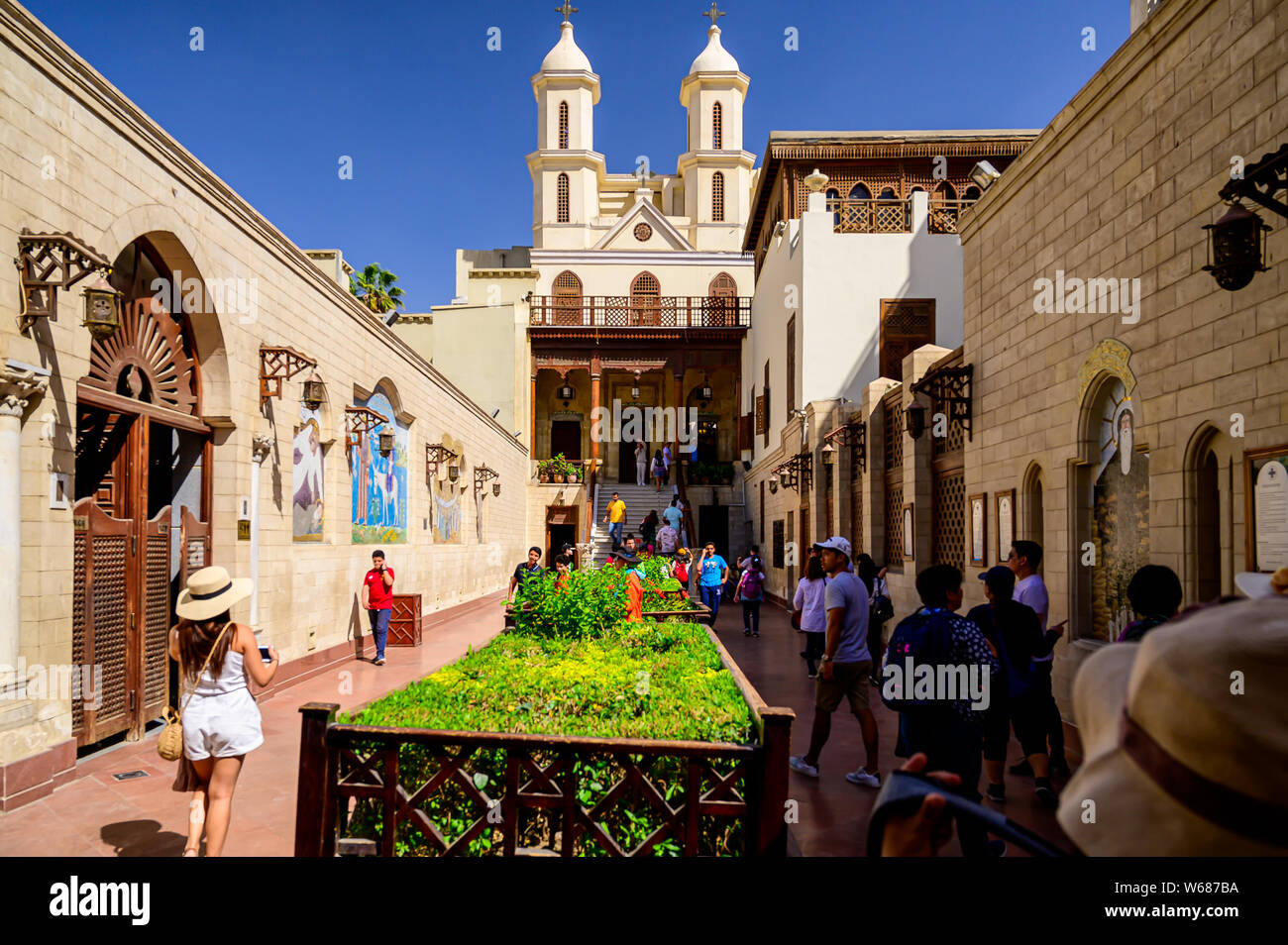 The courtyard of the Hanging Church. The walls of the Courtyard are decorated with contemporary mosaics Stock Photo
