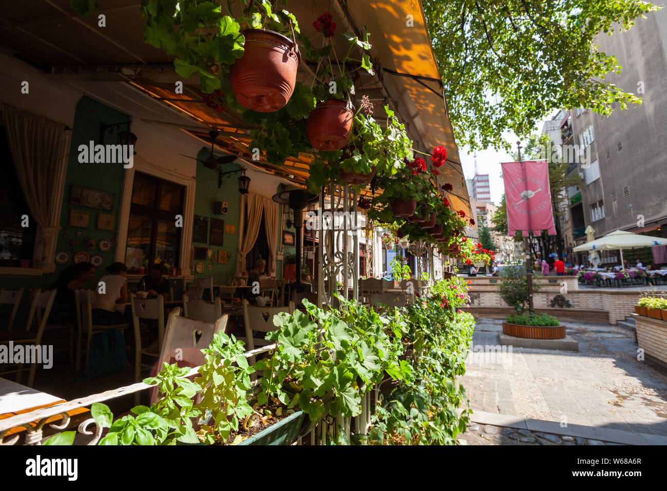 BELGRADE, SERBIA – JULY 07: Visitors enjoy cafes in Skadarlija, Belgrade's bohemian quarter on 07 July 2019 in Belgrade, Serbia. Stock Photo